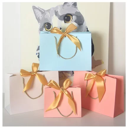 Beautiful paper bags, gift bags, paper bags with handles and ribbons, available in multiple colors to choose from.